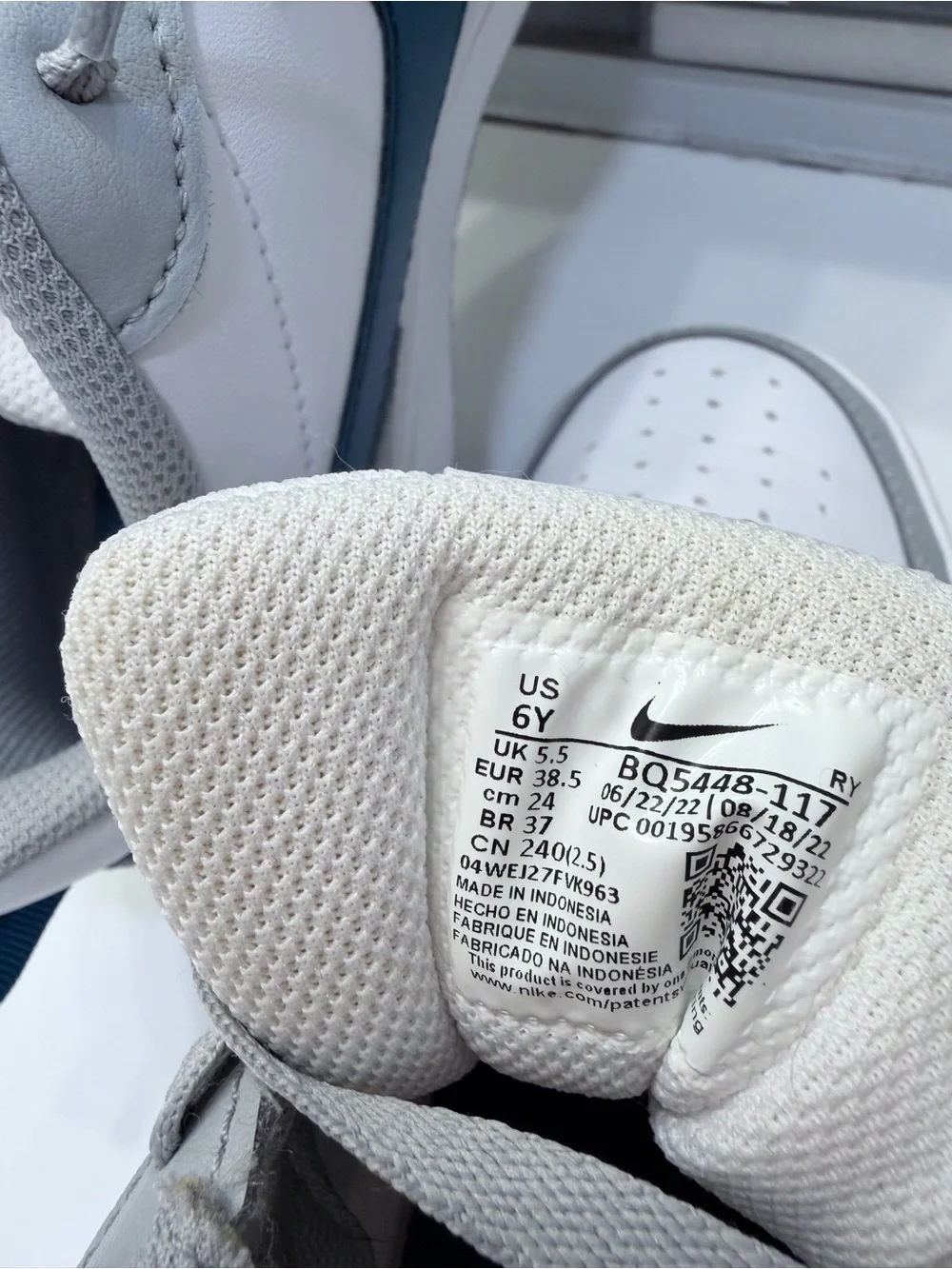 Nike Low-Top Sneakers in White, Gray, and Navy